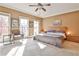 Bright main bedroom with king-size bed and ample natural light at 25 High Gate Trl, Decatur, GA 30030