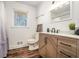 Bathroom with single vanity and shower/tub combo at 8951 Country Club Dr, Douglasville, GA 30134