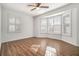 Spacious bedroom with bay window and wood floors at 8951 Country Club Dr, Douglasville, GA 30134