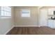 Simple dining room with hardwood floors and two windows at 2833 Lynda Pl, Decatur, GA 30032