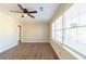 Spacious living room featuring hardwood floors and large windows at 2833 Lynda Pl, Decatur, GA 30032