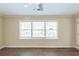 Living room with hardwood floors and a large window at 2833 Lynda Pl, Decatur, GA 30032
