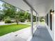 Covered front porch overlooking a well-manicured lawn at 4617 Dunover Cir, Dunwoody, GA 30360