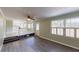 Open living room with hardwood floors and views into the kitchen area at 4617 Dunover Cir, Dunwoody, GA 30360