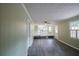 Open concept living room with hardwood floors and lots of natural light at 4617 Dunover Cir, Dunwoody, GA 30360