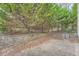 Private backyard with a concrete patio and a privacy fence at 1600 Watercress Se Ct, Mableton, GA 30126