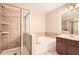Bathroom with shower and soaking tub, double vanity at 1600 Watercress Se Ct, Mableton, GA 30126