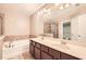 Double vanity bathroom with soaking tub and shower at 1600 Watercress Se Ct, Mableton, GA 30126