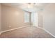 Spacious bedroom with neutral wall and carpet flooring at 1600 Watercress Se Ct, Mableton, GA 30126