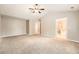 Primary bedroom with ensuite bathroom and carpet flooring at 1600 Watercress Se Ct, Mableton, GA 30126