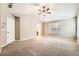 Large Primary bedroom with carpeted floors and an ensuite bathroom at 1600 Watercress Se Ct, Mableton, GA 30126
