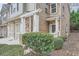 Stone and brick townhome with a private entrance and landscaping at 1600 Watercress Se Ct, Mableton, GA 30126