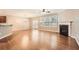 Spacious living room with hardwood floors, fireplace, and lots of natural light at 1600 Watercress Se Ct, Mableton, GA 30126