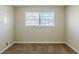 Simple bedroom with neutral wall and carpet flooring at 4312 Pleasant Forest Dr, Decatur, GA 30034