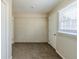 Bedroom with white brick accent wall and carpet at 4312 Pleasant Forest Dr, Decatur, GA 30034