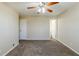 Main bedroom with ceiling fan and access to bathroom at 4312 Pleasant Forest Dr, Decatur, GA 30034