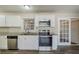 Modern kitchen with stainless steel appliances and granite counters at 4312 Pleasant Forest Dr, Decatur, GA 30034