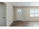 Living room with hardwood floors and French door at 4312 Pleasant Forest Dr, Decatur, GA 30034