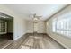 Hardwood floor living room with access to other rooms at 4312 Pleasant Forest Dr, Decatur, GA 30034