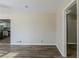 Bright living room with hardwood floors and kitchen view at 4312 Pleasant Forest Dr, Decatur, GA 30034