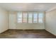 Sunroom with brick wall and wood-look flooring at 4312 Pleasant Forest Dr, Decatur, GA 30034