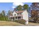 Two-story house with brown roof and landscaping at 4958 Highpoint Ne Way, Marietta, GA 30066