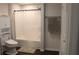 Basement bathroom with shower/tub combo and toilet at 162 Gainesborough Dr, Dallas, GA 30157
