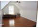 Spacious bedroom with hardwood floors and ceiling fan at 162 Gainesborough Dr, Dallas, GA 30157