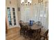 Dining area with hardwood floors and wood table with six chairs at 162 Gainesborough Dr, Dallas, GA 30157