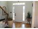 Spacious entryway with hardwood floors, and a view of the staircase at 162 Gainesborough Dr, Dallas, GA 30157