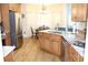 Open kitchen with granite counters, stainless steel appliances, and breakfast nook at 162 Gainesborough Dr, Dallas, GA 30157