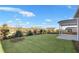 Spacious backyard with grassy lawn and patio at 2798 Turnwater St, Hoschton, GA 30548