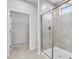 Bathroom with a walk-in shower and closet at 2798 Turnwater St, Hoschton, GA 30548