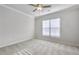 Bright bedroom with large window and ceiling fan at 2798 Turnwater St, Hoschton, GA 30548
