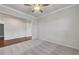 Spacious bedroom with ceiling fan and carpet at 2798 Turnwater St, Hoschton, GA 30548