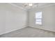 Bright bedroom with window and ceiling fan at 2798 Turnwater St, Hoschton, GA 30548