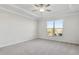 Spacious bedroom with carpeted floors and ceiling fan at 2798 Turnwater St, Hoschton, GA 30548