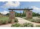 Stone pillars and pergola mark entrance to Del Webb Chateau Elan at 2798 Turnwater St, Hoschton, GA 30548