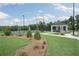 Landscaped courtyard with gazebo near tennis courts at 2798 Turnwater St, Hoschton, GA 30548
