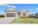 Brick and shingle one-story home with a two-car garage at 2798 Turnwater St, Hoschton, GA 30548