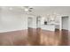 Spacious living area with hardwood floors and kitchen view at 2798 Turnwater St, Hoschton, GA 30548