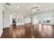 Open living room with hardwood floors and access to patio at 2798 Turnwater St, Hoschton, GA 30548