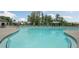 Community lap pool with plenty of lounge chairs at 2798 Turnwater St, Hoschton, GA 30548