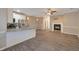 Open concept kitchen and living area with fireplace at 5321 Sherwin Dr, Norcross, GA 30093