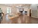 Finished basement with hardwood floors, fireplace, and built in shelving at 5960 Overlook Club Cir, Suwanee, GA 30024