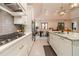 Modern kitchen with white cabinets, granite countertops and stainless steel appliances at 5960 Overlook Club Cir, Suwanee, GA 30024