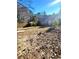 Large backyard with mature trees and shed at 906 Westland Sw Dr, Marietta, GA 30064