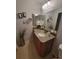 Double vanity bathroom with a large mirror at 906 Westland Sw Dr, Marietta, GA 30064