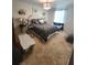 Spacious bedroom with carpeted floors and large bed at 906 Westland Sw Dr, Marietta, GA 30064