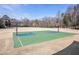 Community basketball courts with well-maintained surfaces at 9970 Groomsbridge Rd, Johns Creek, GA 30022